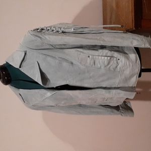 Baby blue leather jacket by Pamela Mccoy.